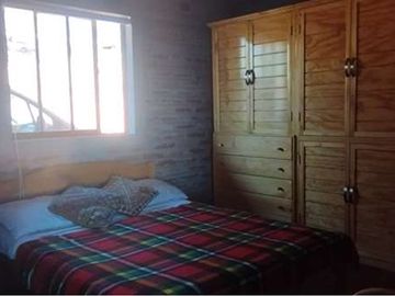 OPORTUNIDAD! PARCELA EN QUEBRADA, CON CASA RÚSTICA