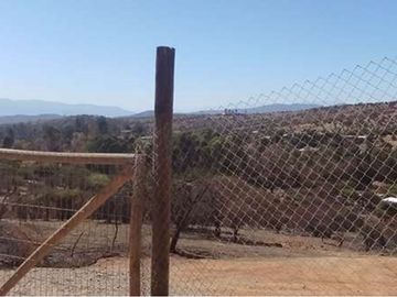 OPORTUNIDAD! PARCELA EN QUEBRADA, CON CASA RÚSTICA