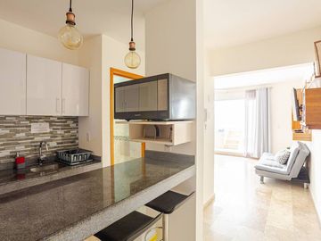 Departamento con patio privado y jacuzzi en colonia Zazilha cerca al mar!