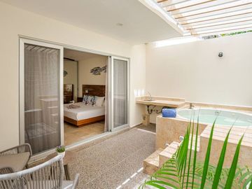 Departamento con patio privado y jacuzzi en colonia Zazilha cerca al mar!