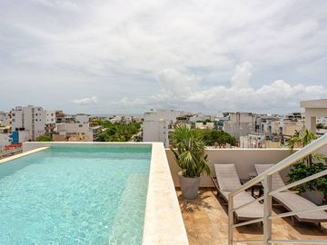 Departamento con patio privado y jacuzzi en colonia Zazilha cerca al mar!