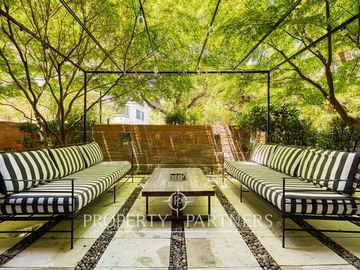 Fabuloso duplex con jardín en excelente sector de Vitacura