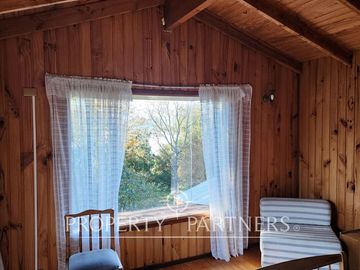 Dos casas en terreno urbano con vista al lago y volcán