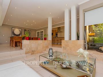 Hermosa Parcela en exclusivo Condominio las Tórtolas, Santa Rita, el mejor sector de Pirque ( Con derecho de canal)