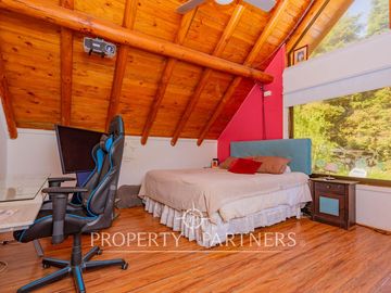 Hermosa Parcela en exclusivo Condominio las Tórtolas, Santa Rita, el mejor sector de Pirque ( Con derecho de canal)