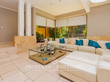 Hermosa Parcela en exclusivo Condominio las Tórtolas, Santa Rita, el mejor sector de Pirque ( Con derecho de canal)