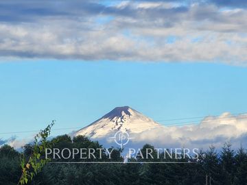 Parcelas planas con caminos, agua, luz y vista volcán Villarrica