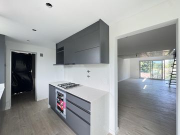 Venta - Departamento de dos dormitorios con balcón y amenities en Condominios Bagua, Funes