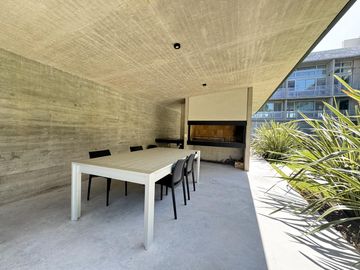 Venta - Departamento de dos dormitorios con balcón y amenities en Condominios Bagua, Funes