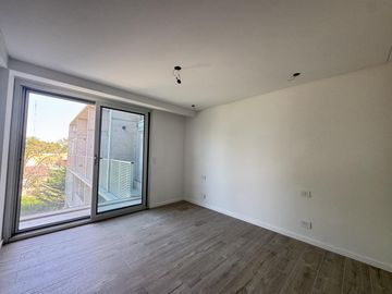 Venta - Departamento de dos dormitorios con balcón y amenities en Condominios Bagua, Funes