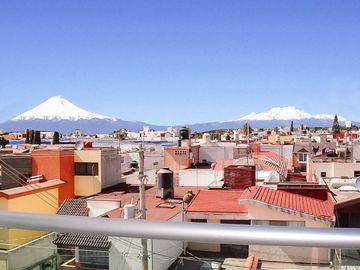 Edificio de Departamentos con Vistas al Popocatépetl en Ubicación Privilegiada