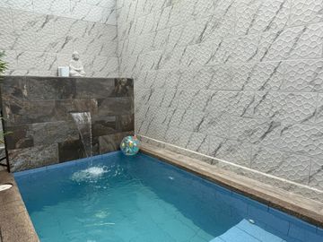 Venta de casa con piscina,142m2 construcción sector Alangasi