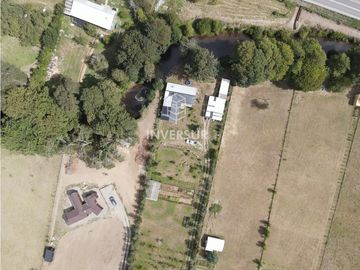 HERMOSA PARCELA CON ORILLA DE RIO Y 2 CASAS A 30 MIN DE VALDIVIA