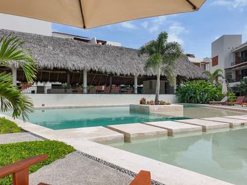 Departamento exclusivo en Planta Alta con Roof Garden Privado – Bahía de Banderas / Puerto Vallarta