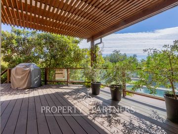 Parcela Llena de Luz y Espacios Abiertos en exclusivo y seguro condominio La Rinconada del Principal, Pirque (con piscina, quincho y un gran jardín)