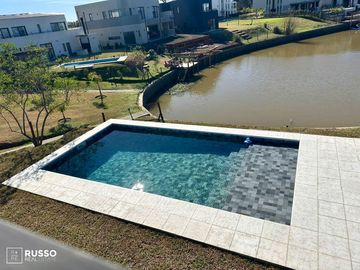 CASA EN VENTA CON SALIDA AL RIO - BARRIO CANAL