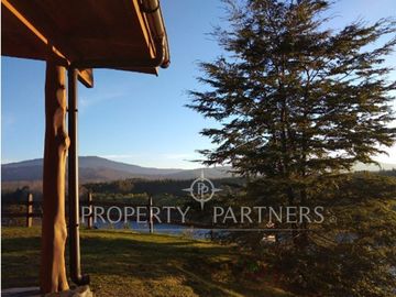 Hermosa Parcela con dos casas vista al Río