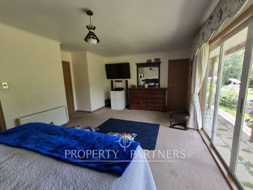 Hermosa Parcela con Amplia Casa en Condominio Miraflores