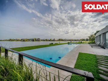Venta departamento 4 ambientes con dep. Aqua Golf, Nordelta, vista lago, jardín propio Oportunidad.