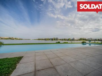 Venta departamento 4 ambientes con dep. Aqua Golf, Nordelta, vista lago, jardín propio Oportunidad.