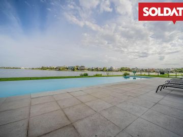 Venta departamento 4 ambientes con dep. Aqua Golf, Nordelta, vista lago, jardín propio Oportunidad.
