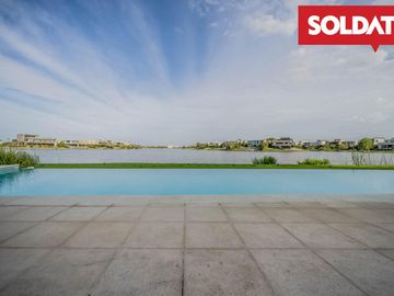 Venta departamento 4 ambientes con dep. Aqua Golf, Nordelta, vista lago, jardín propio Oportunidad.