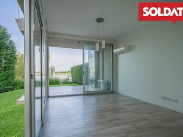 Venta departamento 4 ambientes con dep. Aqua Golf, Nordelta, vista lago, jardín propio Oportunidad.