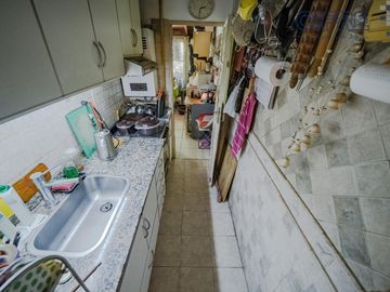 Departamento en PB de 2 ambientes con quincho y jardín en Coghlan