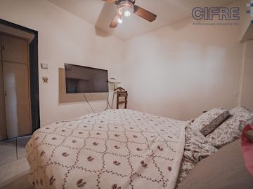 Departamento en PB de 2 ambientes con quincho y jardín en Coghlan