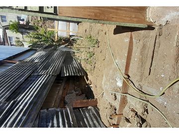 Terreno con Casa En Puerto Aysen N° 166, Cer