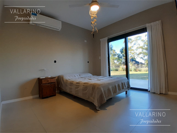 Casa 3 dormitorios con parque, Loteo San Juan Primero, Colón.