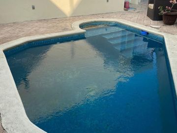 CASA EN VENTA  DE 1 PISO CON ALBERCA EN AMPL. UNIDAD NACIONAL