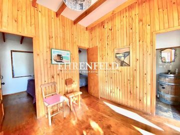 Olmué. Casa en condominio, con negocio de paltos funcionando.