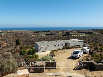 Casa de Ensueño con Vista Despejada al Mar en Exclusivo Condominio Agua Dulce, Huentelauquén