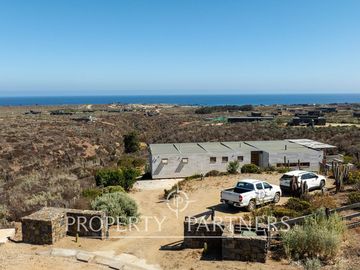 Casa de Ensueño con Vista Despejada al Mar en Exclusivo Condominio Agua Dulce, Huentelauquén