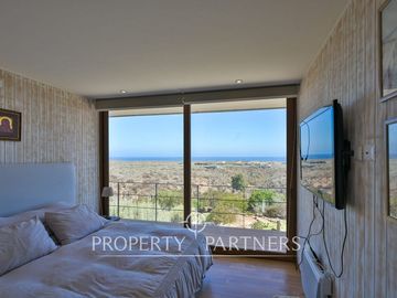 Casa de Ensueño con Vista Despejada al Mar en Exclusivo Condominio Agua Dulce, Huentelauquén