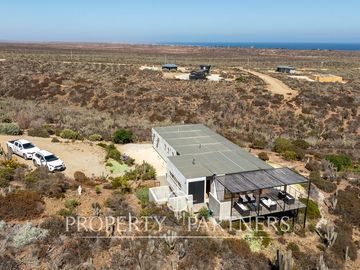 Casa de Ensueño con Vista Despejada al Mar en Exclusivo Condominio Agua Dulce, Huentelauquén