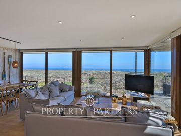Casa de Ensueño con Vista Despejada al Mar en Exclusivo Condominio Agua Dulce, Huentelauquén