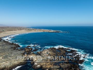 Casa de Ensueño con Vista Despejada al Mar en Exclusivo Condominio Agua Dulce, Huentelauquén
