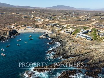 Casa de Ensueño con Vista Despejada al Mar en Exclusivo Condominio Agua Dulce, Huentelauquén