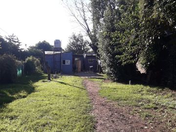VENTA  LOTE  CON MEJORAS LIBERTAD MERLO FINANCIA