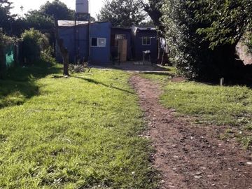 VENTA  LOTE  CON MEJORAS LIBERTAD MERLO FINANCIA