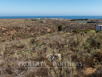 “Vive Frente al Mar en Agua Dulce: Terreno Exclusivo con Vista Inalterable en Huentelauquén”