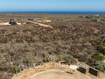 “Vive Frente al Mar en Agua Dulce: Terreno Exclusivo con Vista Inalterable en Huentelauquén”