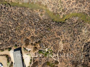 “Vive Frente al Mar en Agua Dulce: Terreno Exclusivo con Vista Inalterable en Huentelauquén”