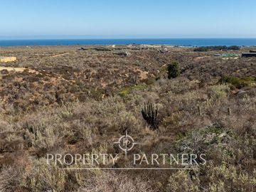 “Vive Frente al Mar en Agua Dulce: Terreno Exclusivo con Vista Inalterable en Huentelauquén”