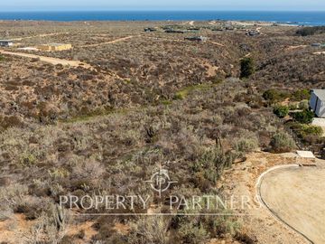 “Vive Frente al Mar en Agua Dulce: Terreno Exclusivo con Vista Inalterable en Huentelauquén”
