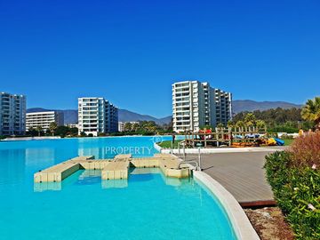 Una Oportunidad de Inversión Rentable en Papudo: Departamento con Vista al Mar y Humedal