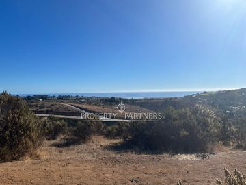 Parcela  con espectaculares vistas en Condominio Coguiles