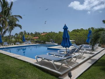 Departamento de 2 Recámaras Frente a la Marina En Venta - Puerto Aventuras